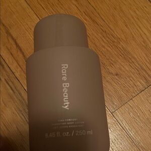 Rare Beauty body lotion price firm